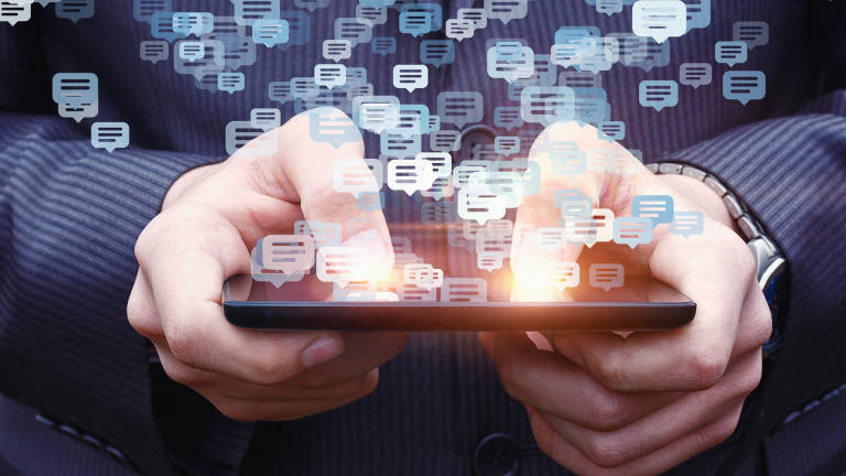 Businessman chatting on a cell phone.